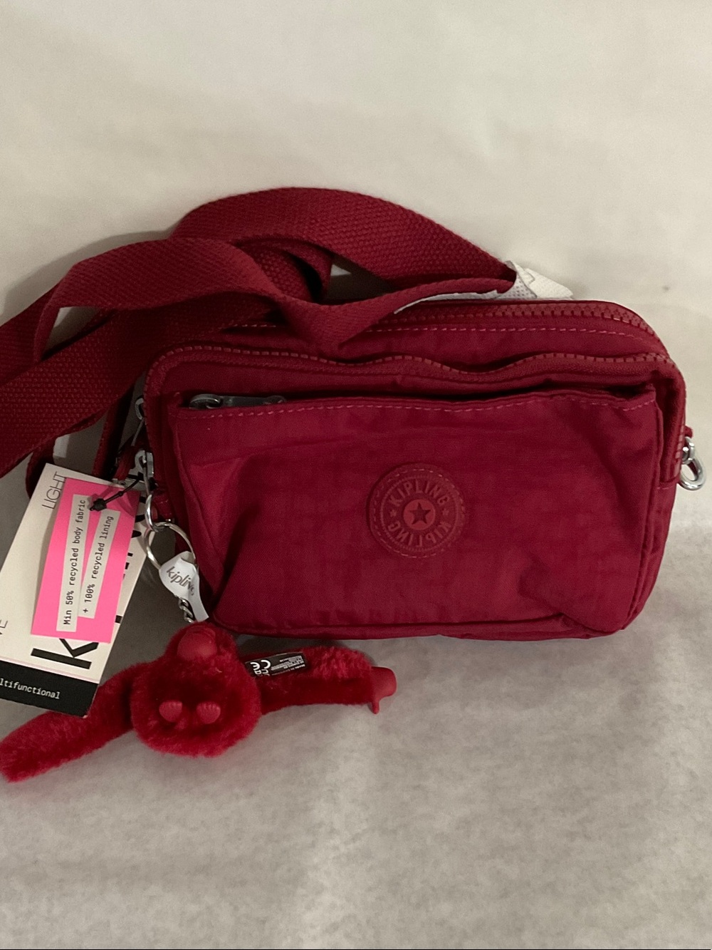 Kipling Deep Red Crossbody Bag with Monkey Charm